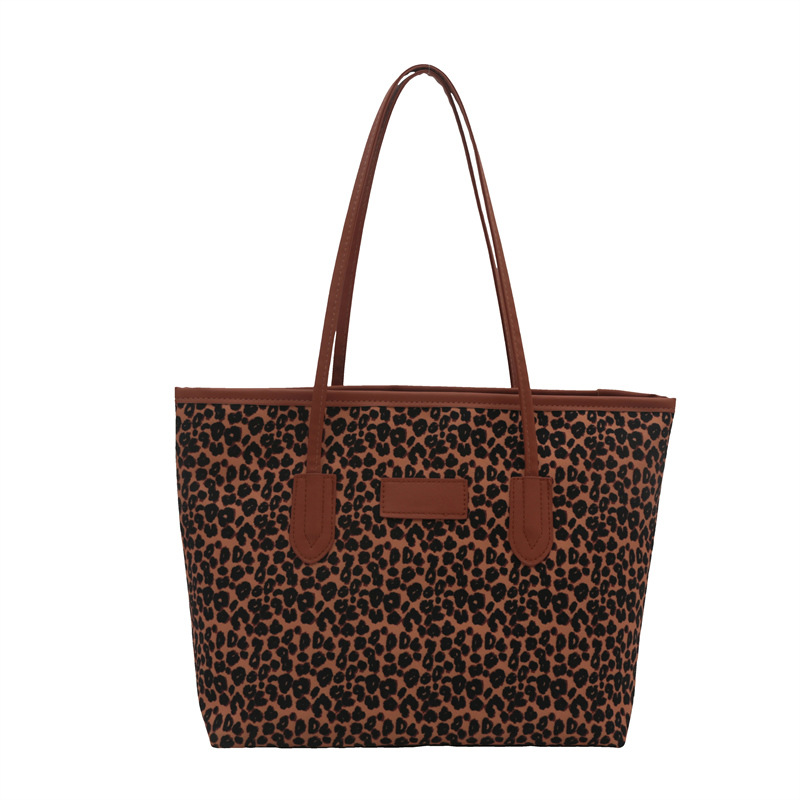 2024 en línea caño invierno nuevo retro leopardo bolso de lona bolso de hombro de niñas bolso de mano casual de gran capacidad
