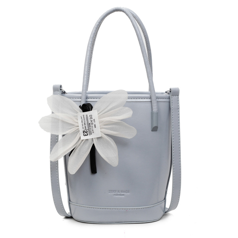 Bolso de moda personalizado bolso de cubo de textura de color sólido 2025 nuevo bolso de hombro de color sólido casual bolso de mensajero de cercanías