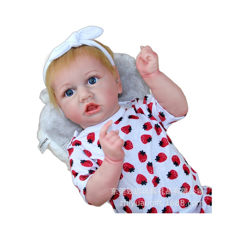 Ia suave pesado comercio electrónico bebé 22 pulgadas venta al por mayor muñecas juveniles calientes juguetes de goma de acero muñecas rubias