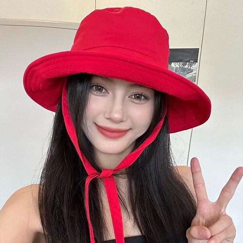 Red versatile Korean style strappy fisherman hat for women, lightweight, breathable, large brim, travel-showing face, small sunshade hat
