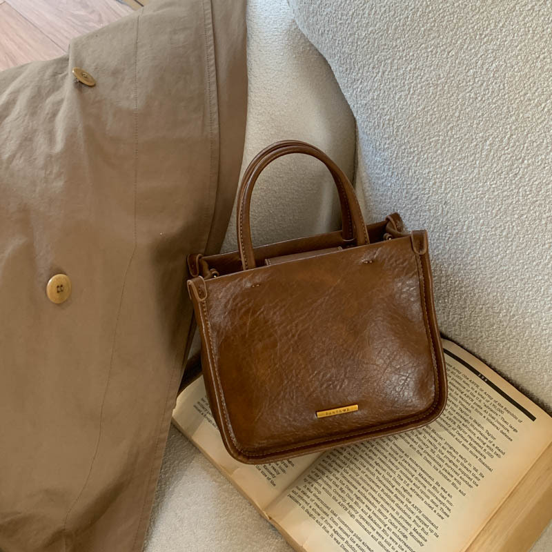Bolsa de mano retro de alto nivel 2026 nuevo ocio simple bolso cuadrado para viajar bolso universal image 11