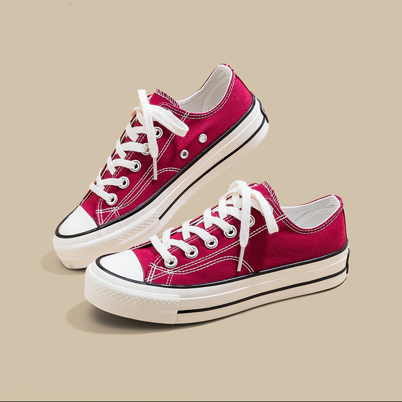 Zapatos de lona de tacón plano de mujer explosión baja estilo de moda coreano versátil estilo clásico retro nicho diseño zapatos de lona blancos image 13