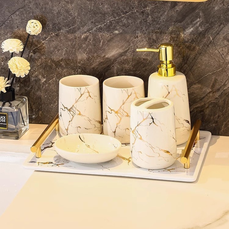 Baños del hotel con oro pintado set de lavado de comercio exterior creativo de mármol botella de emulsión enjuague bucal accesorios de baño
