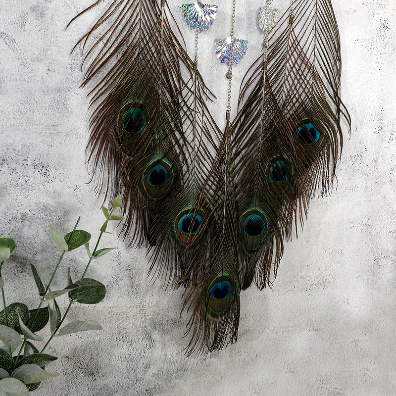 Transfronterizo pluma de pavo real Dream Catcher adornos campanas de viento tejidas a mano campana Dream Catcher colgante habitación decoración de la pared al por mayor