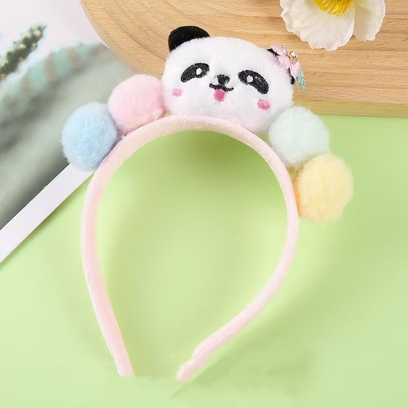 男女通用の大きいパンダのカチューシャは卸売りします。