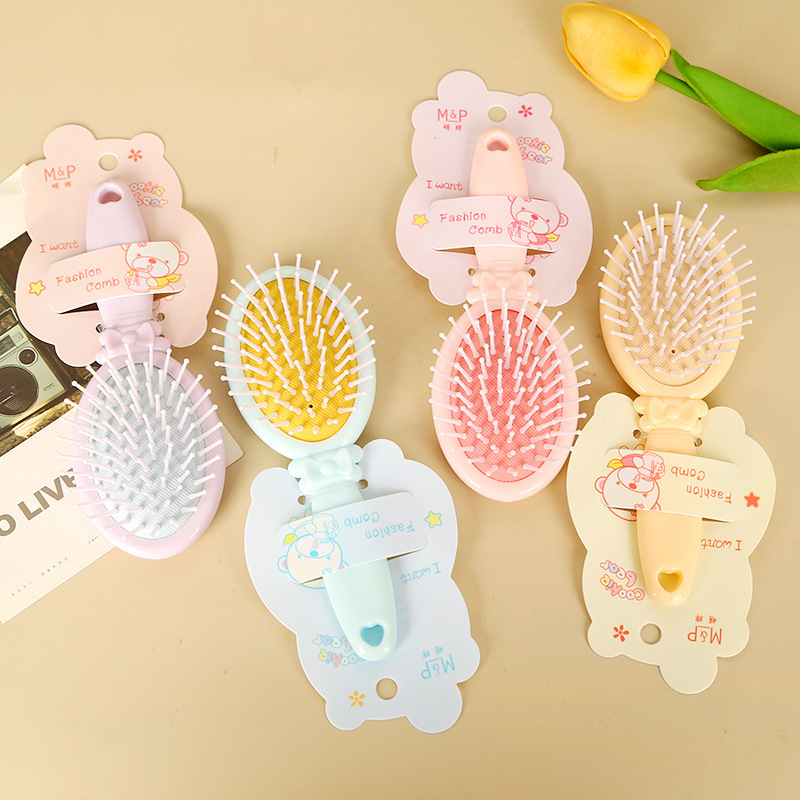 新商品のキャンディー色のエアクッションの美容櫛の少女のかわいい女の子の携帯の小さい櫛のエアバッグは櫛の卸売りをマッサージします。|undefined