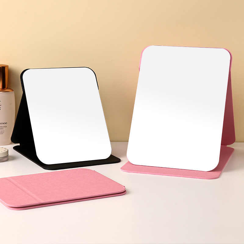 Espejo plegable de cuero PU Dormitorio de estudiantes Espejo de maquillaje de belleza de estilo princesa Espejo de tocador simple de escritorio para el hogar