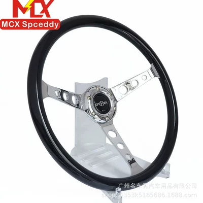 black round-hole steering wheel | Steering wheel
