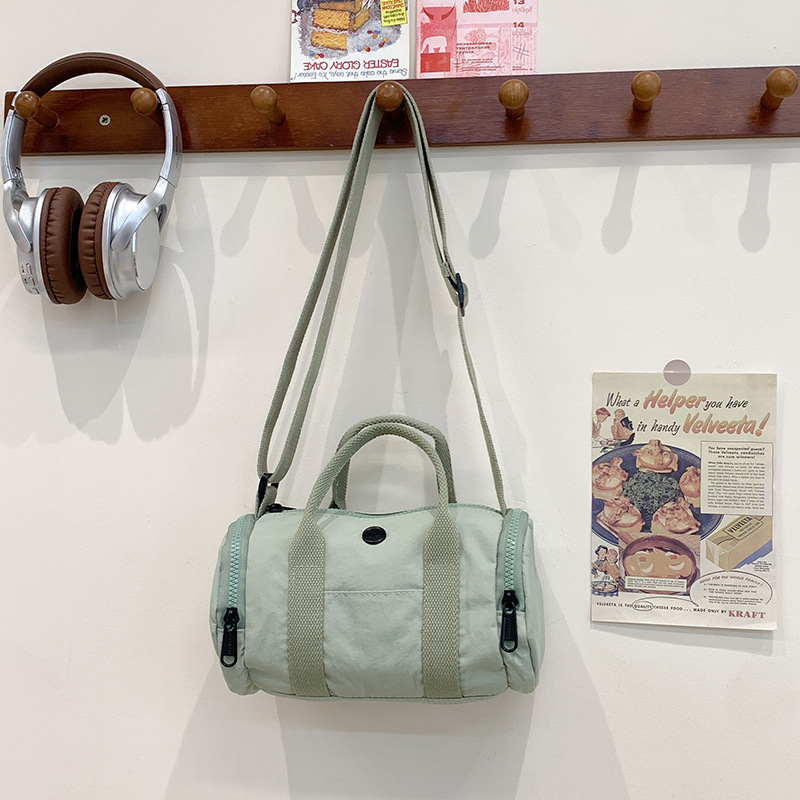 Bolso de hombro para niños y niñas de estilo coreano, color de contraste de moda, bolso de tubo portátil para bebé simple casual, nuevo bolso de almohada para niños