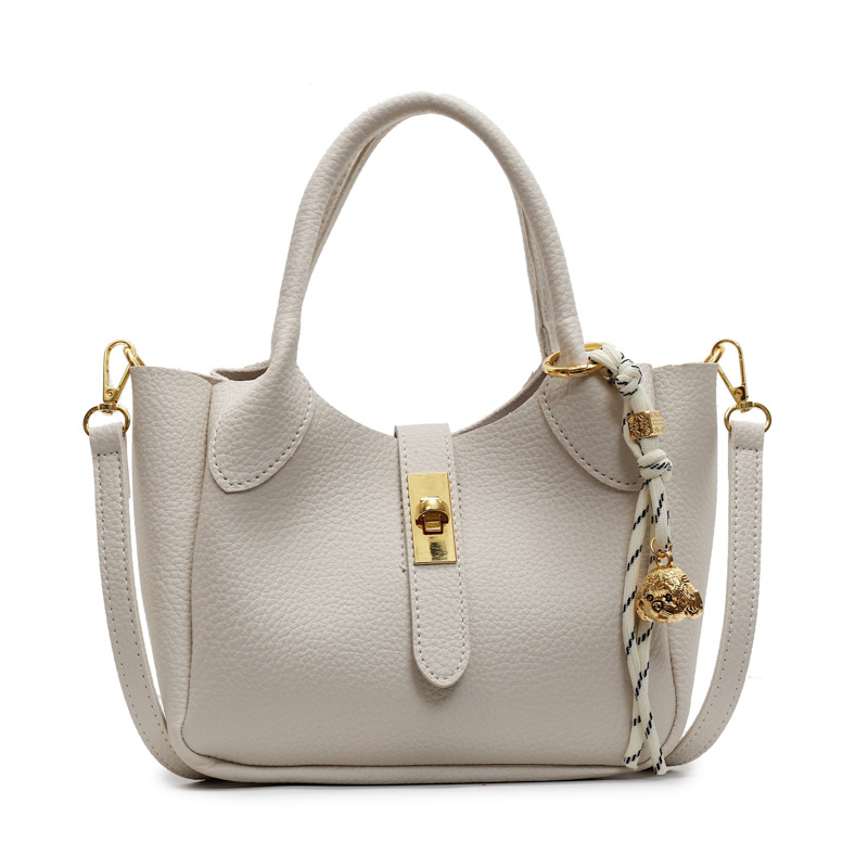 Bolso de cesta de verduras simple de comercio exterior para mujer 2025 nuevo bolso de hombro casual salvaje de moda bolso de cubo de aire extranjero