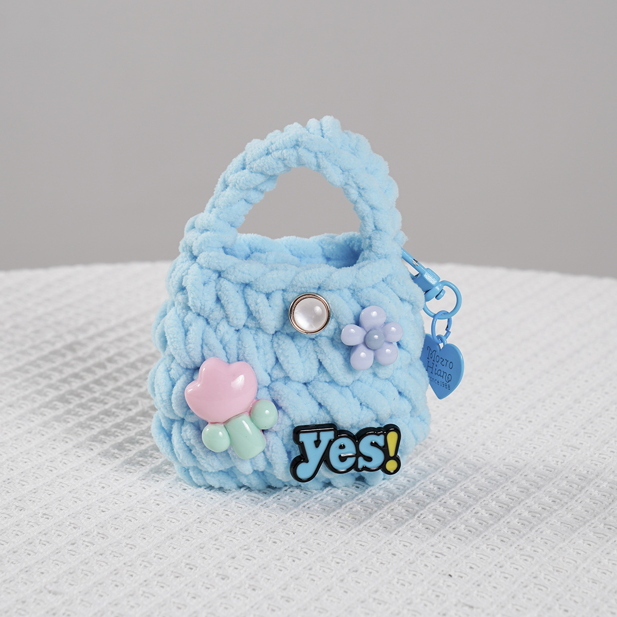 Productos terminados japoneses INS dulce, creativo, encantador, gancho artesanal, auriculares Bluetooth resistentes a la caída, bolso transfronterizo Amazon