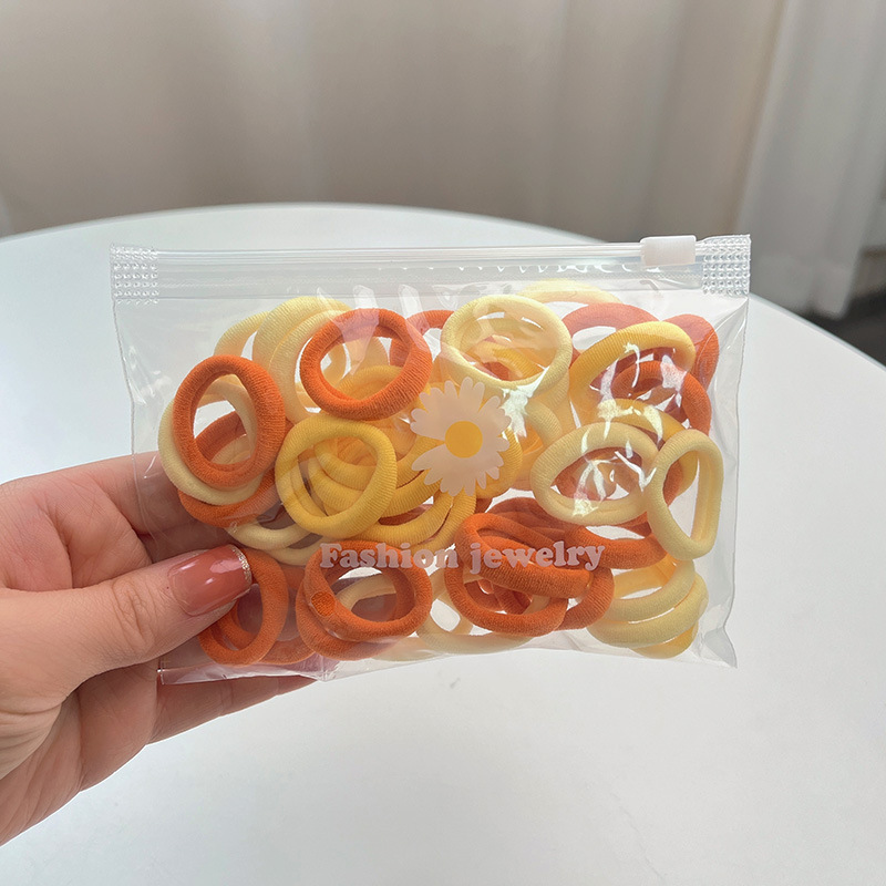 ゴムバンドの髪飾り高馬尾高弾力は髪を傷つけず、髪を丈夫にして髪輪のカラー紐を結びます。|undefined