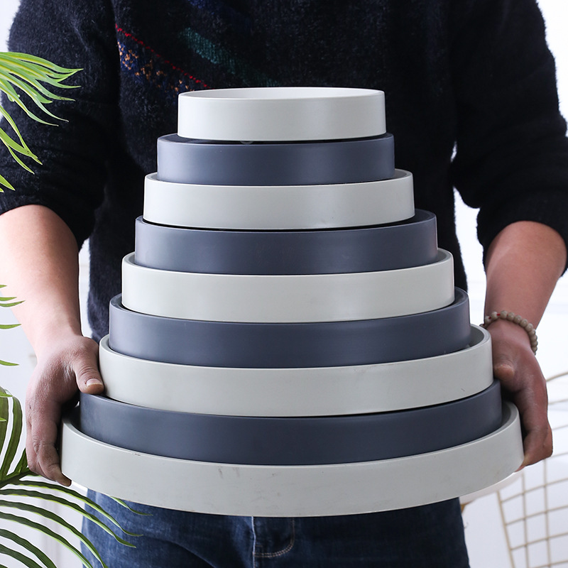 厚いプラスチックの移動可能な溝型の植木鉢のトレーの台座のプーリの底の支えの植木鉢の受け皿のプーリの底の敷き物