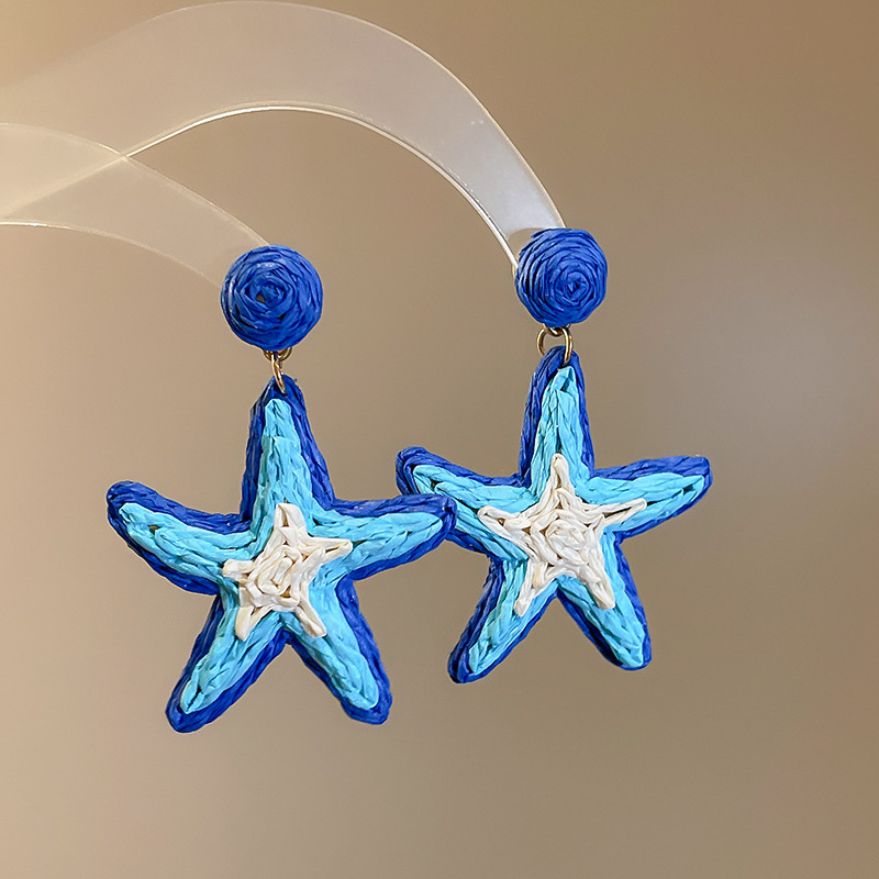 Pendientes de estrella de mar tejido de rafia Pendientes de estilo Semia Pendientes de moda Pendientes de todo fósforo Sensación de clase alta de nicho