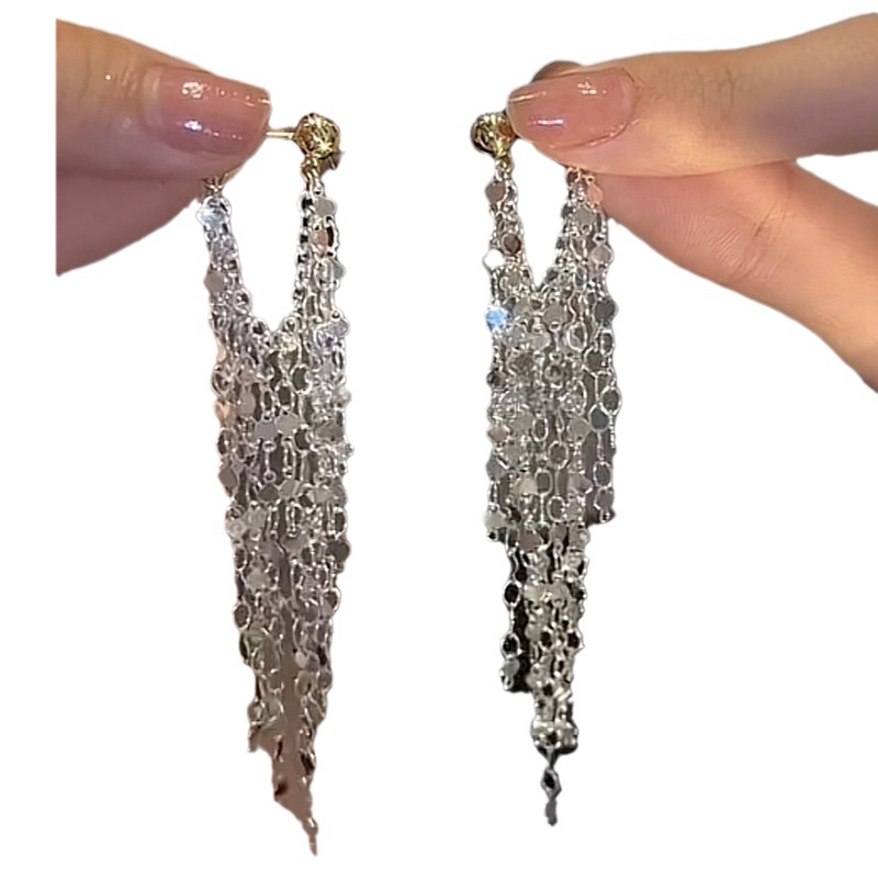 Aguja de plata con lentejuelas pendientes largos de la borla nicho de alto grado de luz pendientes de lujo nicho de moda pendientes de alto grado