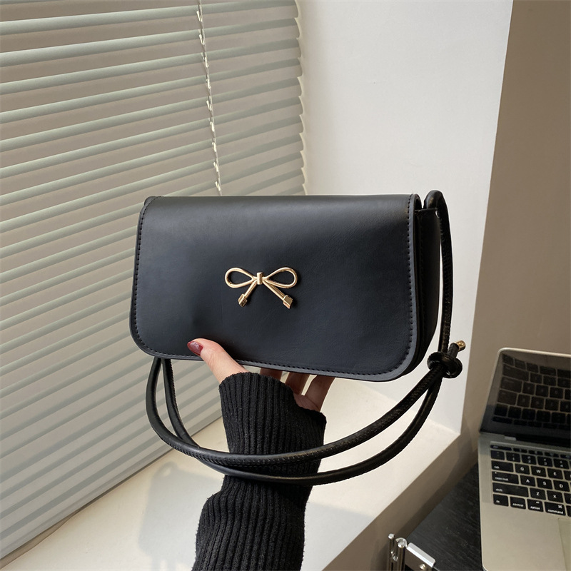 2025 verano nuevo estilo nicho bolso de axila moda femenina bolso cuadrado pequeño portátil ins bolso de hombro de estilo occidental