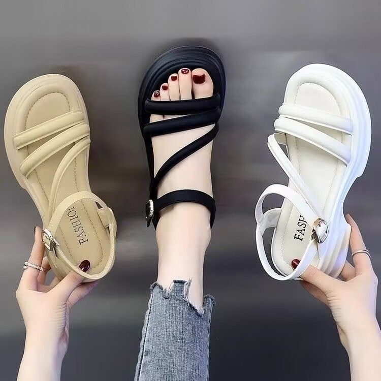 Sandalias de fondo grueso para mujeres verano 2026 nuevo estilo de ropa exterior alta sensación versátil Roma slope talón muffin hadas sandalias super caliente