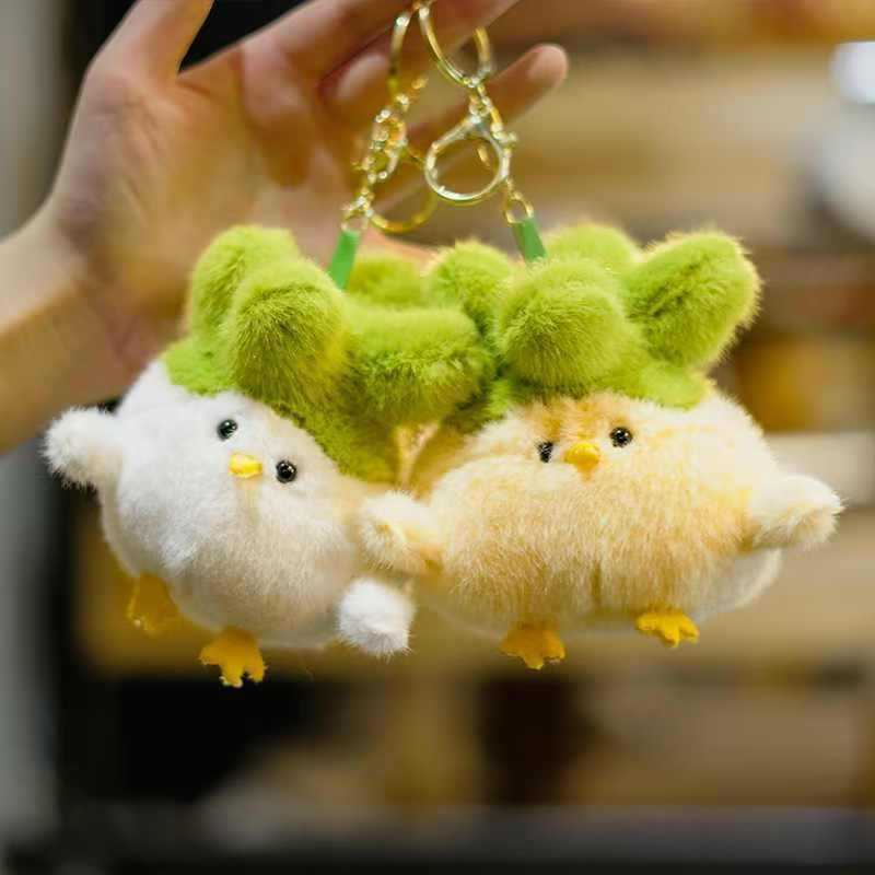 新商品のニンニクの鳥の声のぬいぐるみの記念品は漫画のおかずのニワトリを掛けて音声の公仔のキーホルダーをおかしなことをします。|undefined