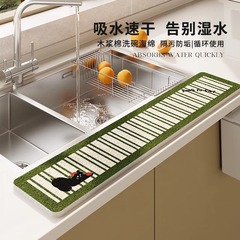 台所の水槽のテーブルの上の吸水マットは水の手洗い台の溝の辺の狭いスポンジのマットのトイレの木の糊の綿の清潔な拭きを防ぎます。