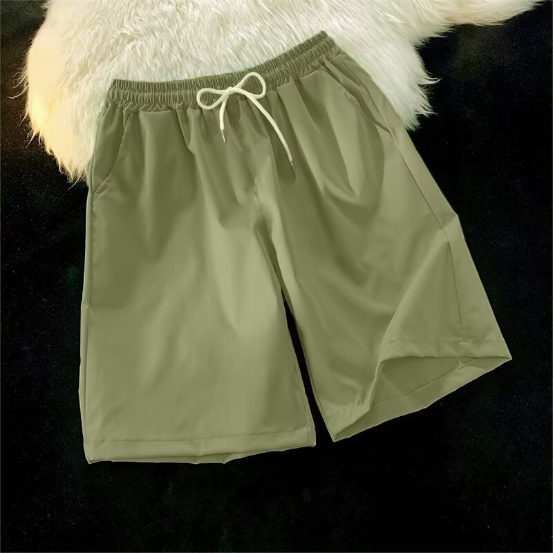 Personalizado al por mayor caramelo de viento neutro multicolor 25 colores primavera y verano nuevos pantalones cortos casuales de cinco puntos sueltos y cómodos