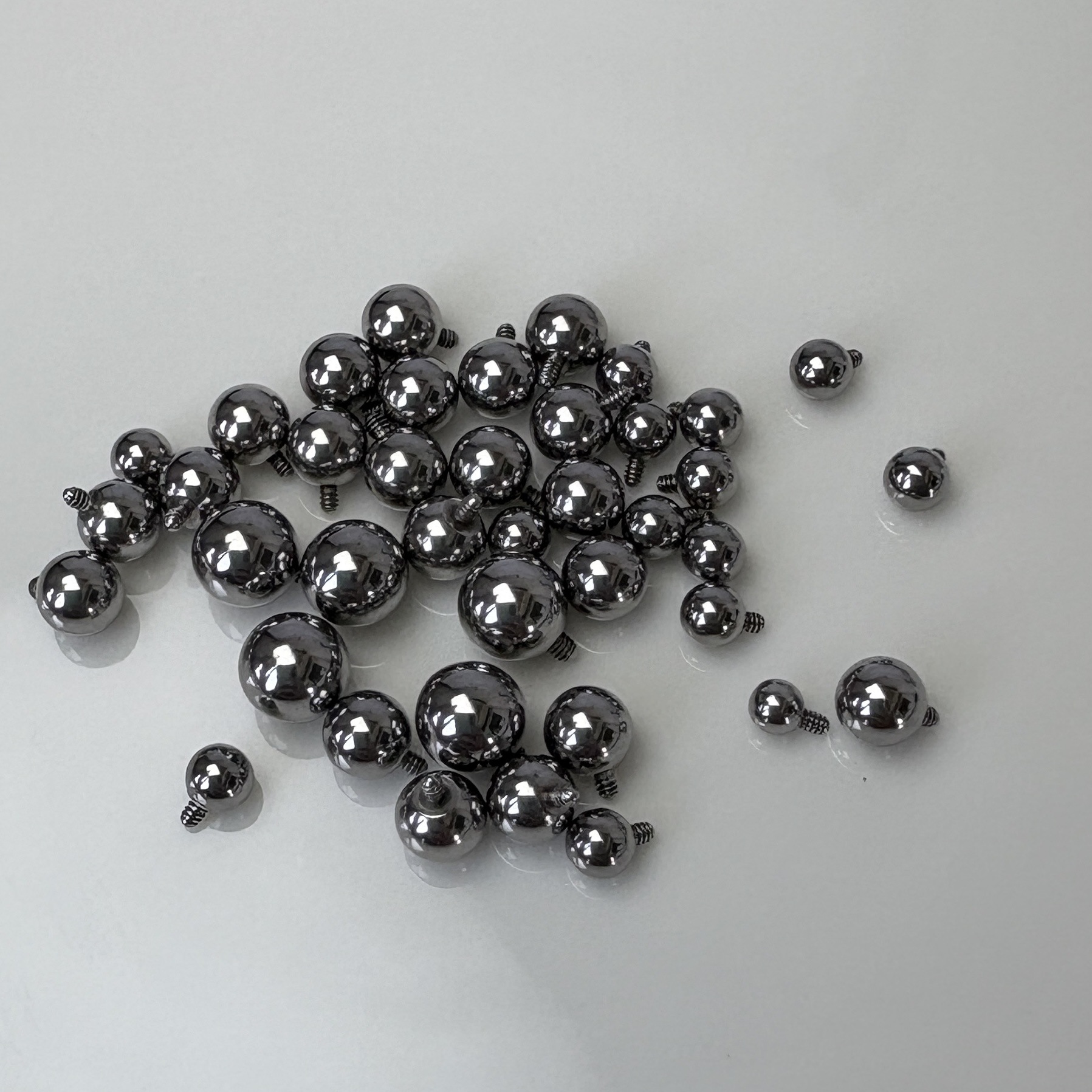 Silver pointed spike labret stud material detail