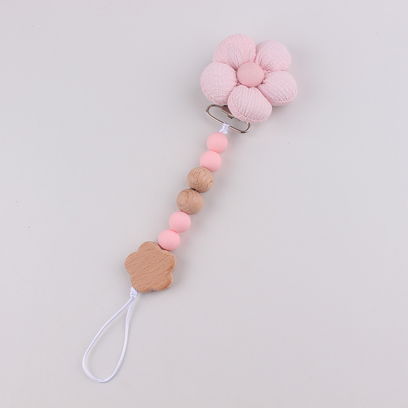 Productos para bebés pacificadores de tetas anti-caída cadena INS cadena de diente de viento flor de madera