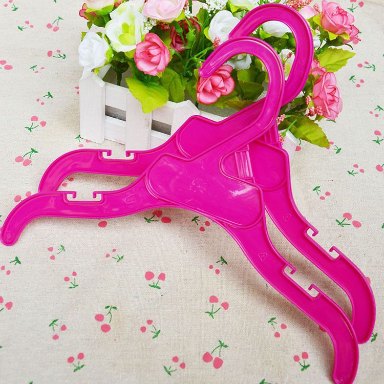 Ropa de perro percha de plástico percha de mascotas percha de niños percha pequeña fábrica de percha al por mayor venta directa lindo perro pequeño