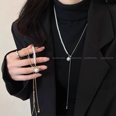 真珠の数珠蛇の骨のチェーンのネックレスを調節することができます。