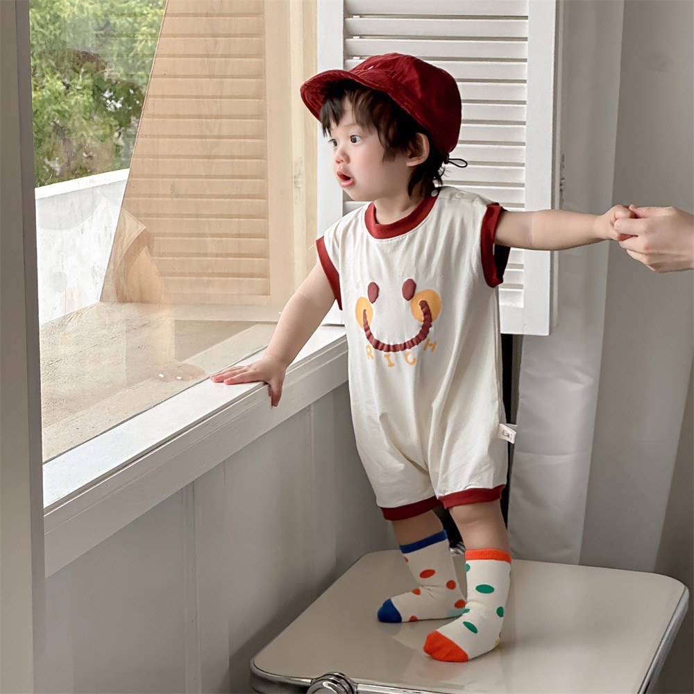 Estilo delgado de verano de estilo coreano, ropa de salida de clase, cara sonriente de dibujos animados, bebé de un año, cuello redondo sin mangas, mono casual