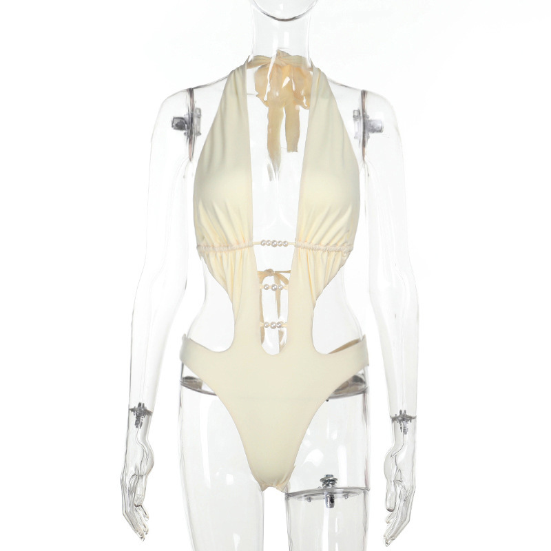 XY25152 verano nuevo estilo estilo europeo y americano tendencia de la moda cuentas huecas aguas termales natación halter cómodo mono