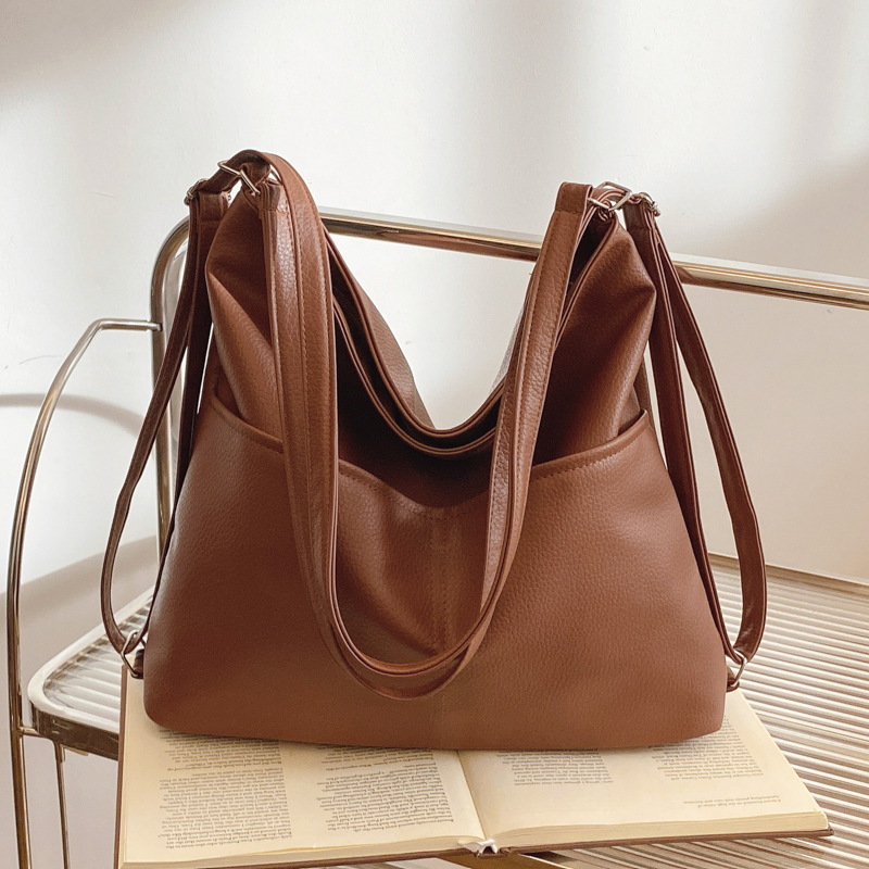 Bolso de invierno para mujeres 2024 nuevo estilo simple bolso de brazo de viaje de gran capacidad bolso de hombro de alta calidad sensación bolso