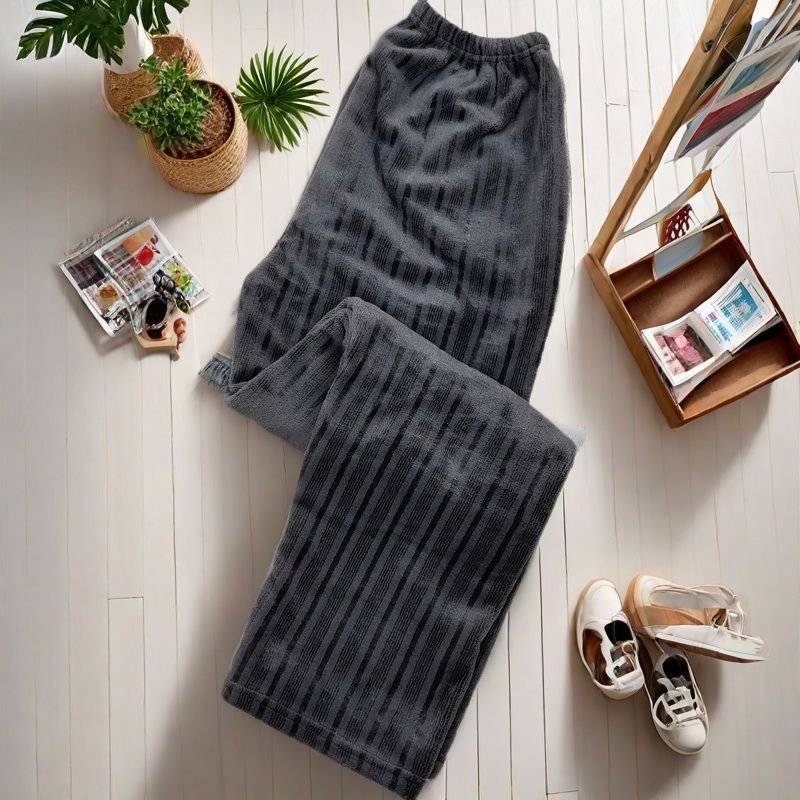 2025 otoño y invierno de franela gruesa pijamas de color sólido para hombres y mujeres de tamaño caliente se pueden usar pantalones de mediana edad y pantalones caseros