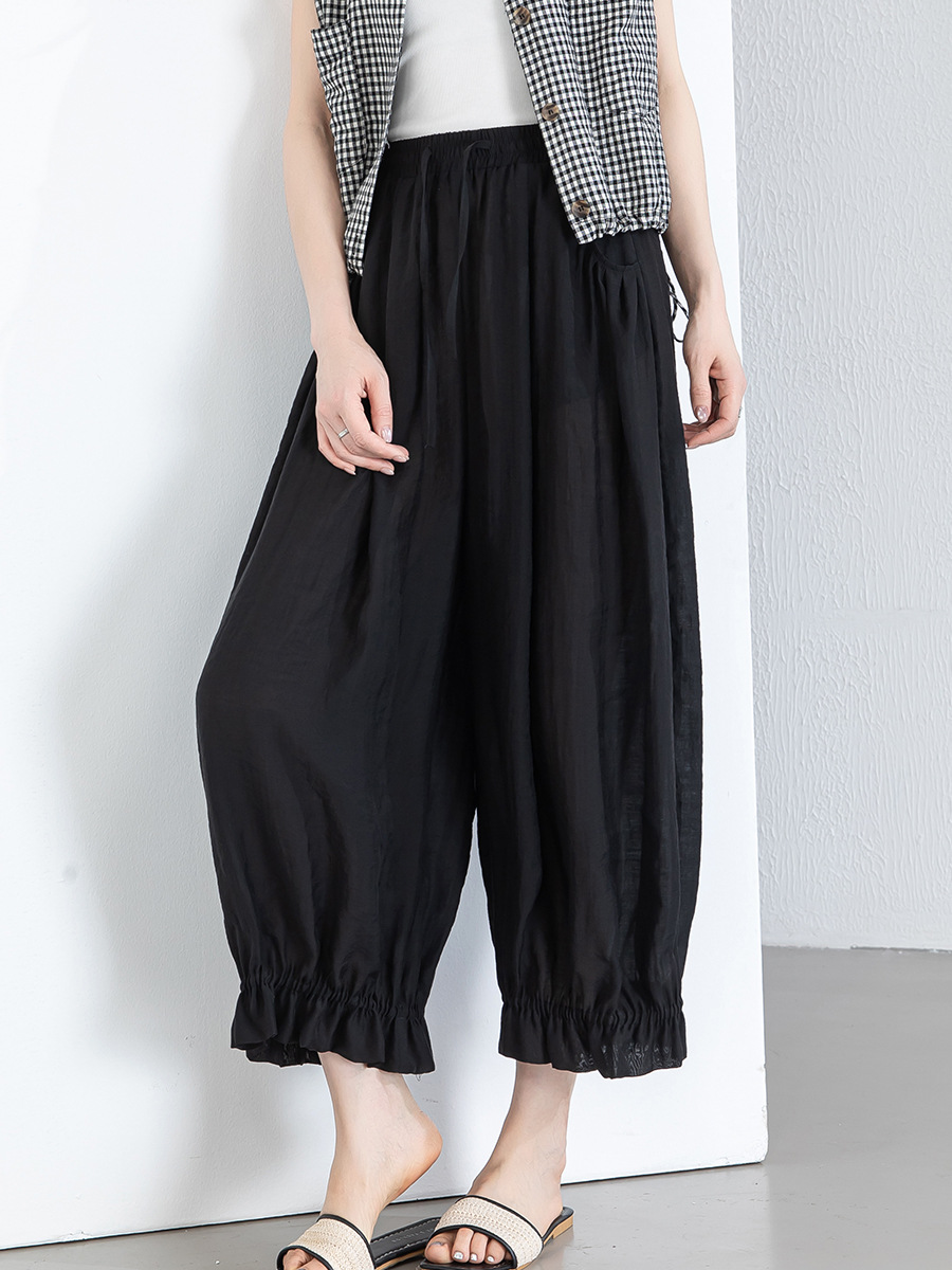 Quần culottes nữ ống rộng cạp chun co giãn, chất liệu Lyocell thoáng mát, dáng hoa tulip che khuyết điểm — màu đen