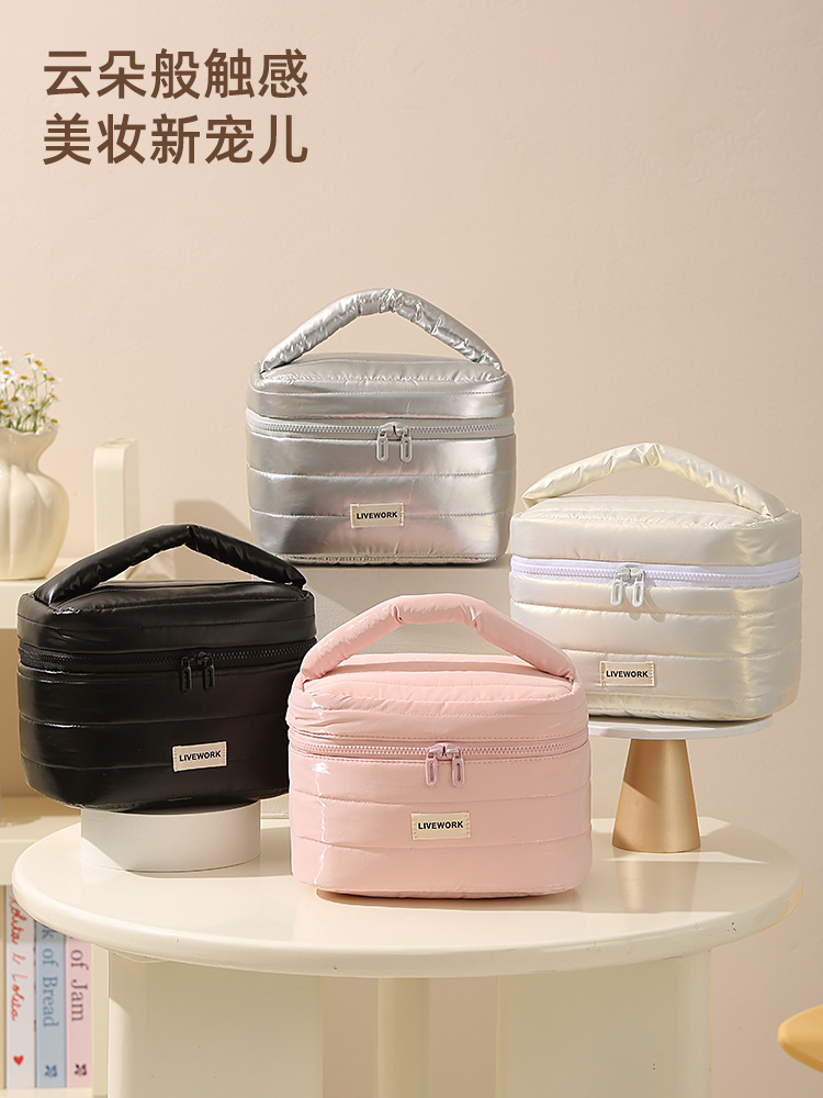 Nueva bolsa de almacenamiento portátil impermeable bolsa de maquillaje de mano bolsa de viaje bolsa de plumaje bolsa de maquillaje de alta capacidad