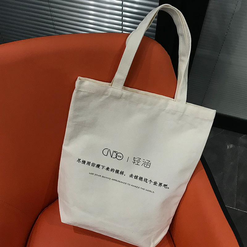 Bolsa de lona al por mayor en blanco en stock DIY pintada a mano graffiti producción bolsa de lona blanca portátil hombro logotipo personalizado