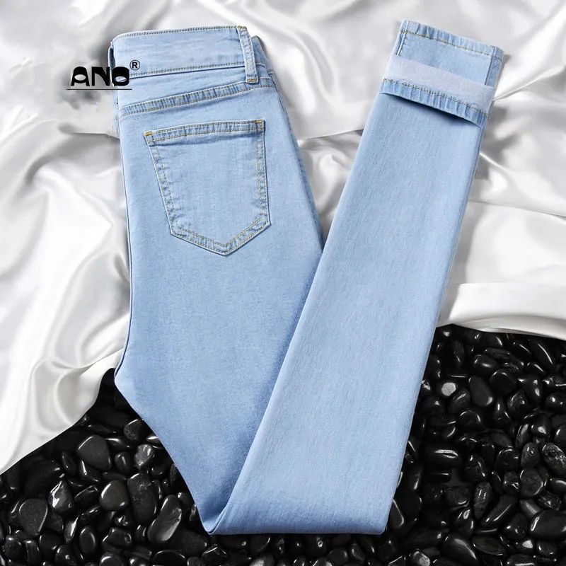 Light blue high waist skinny jeans trous...