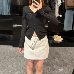 2025新型純色デザイン感バッグヒップスカート片辺延長非対称デニム半スカート女性