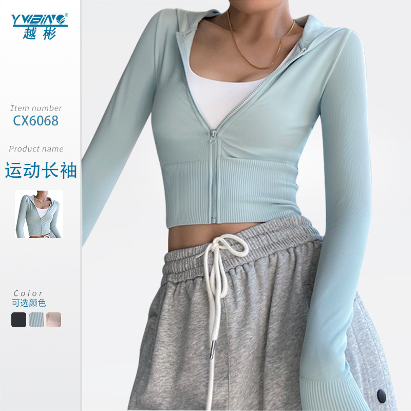 Abrigo de yoga Otoño e Invierno nueva ropa de entrenamiento ajustada elástica de secado rápido de manga larga con capucha superior deportiva para mujeres