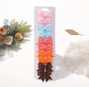 Juego de horquillas con lazo de cola de milano para niños de estilo caliente de Amazon, lindo y versátil, horquilla diaria para niñas europeas y americanas 323