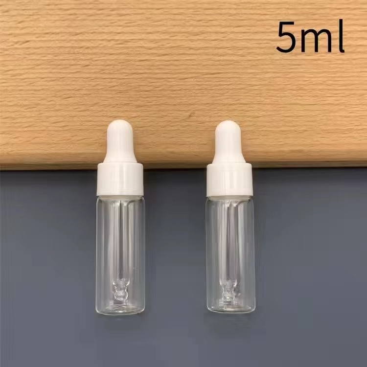 Botella de goteo botella de aceite esencial botella de esencia cosmética líquido muestra pequeña botella vacía portátil botella de vidrio 5 / 10ml