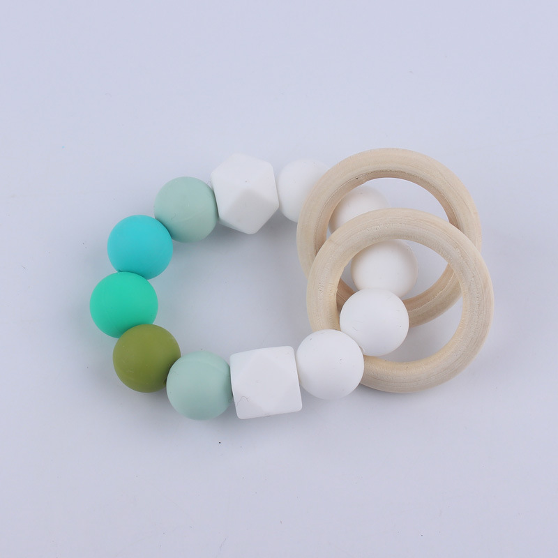 Nuevos suministros para bebés Cadena de chupete DIY creativo contraste color cuentas de silicona mordedor anti-caída traje de cadena