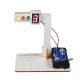 Primary school students assembling materials DIY intelligent traffic lights physical science experimental equipment traffic lights small production