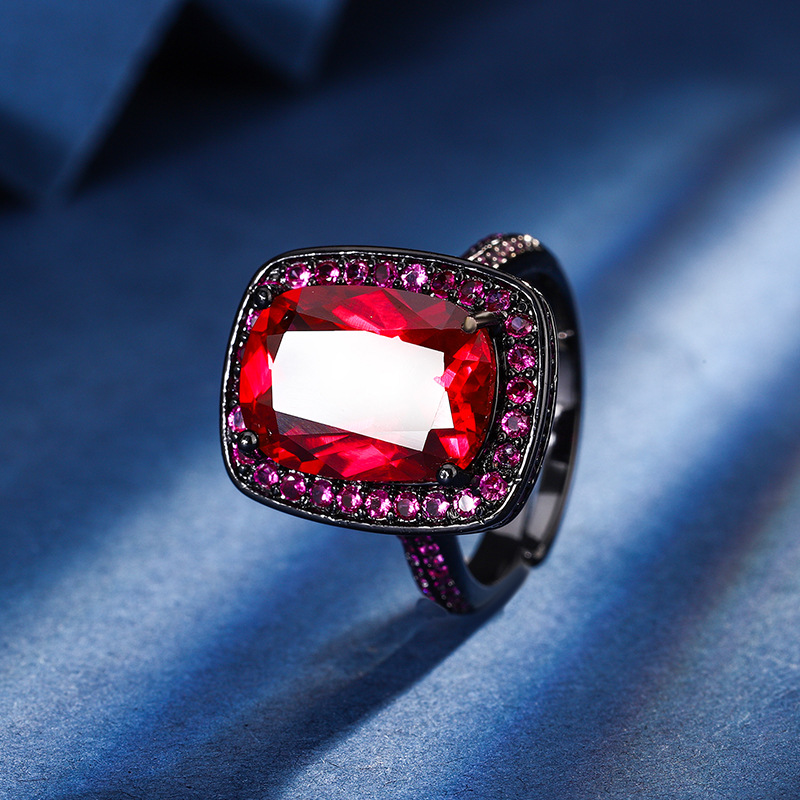 Zhuang Shengsheng Jewelry Fondo de cobre chapado en oro simulación corindón rojo cristal puntiagudo azul temperamento cuadrado gordo traje de oro negro mujer 10*14