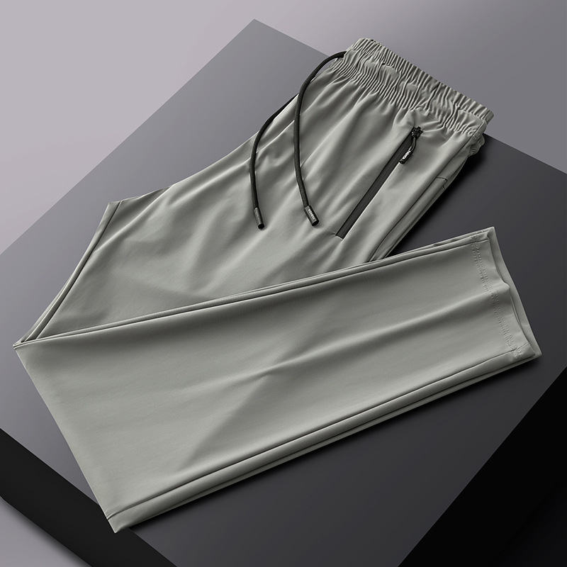 2025 verano pantalones deportivos de talla grande pantalones de hombre pantalones de aire acondicionado pantalones de seda de hielo de secado rápido pantalones de pierna recta gorda al por mayor