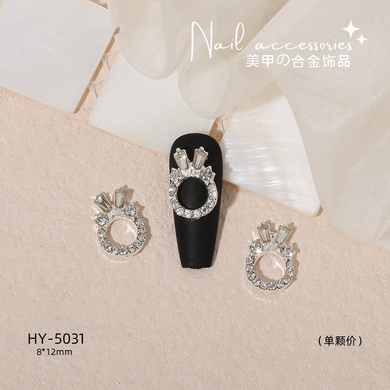 Nuevo arco de uñas amor aleación decoración de uñas flor de la luna mariposa clavo taladro fábrica joyería al por mayor