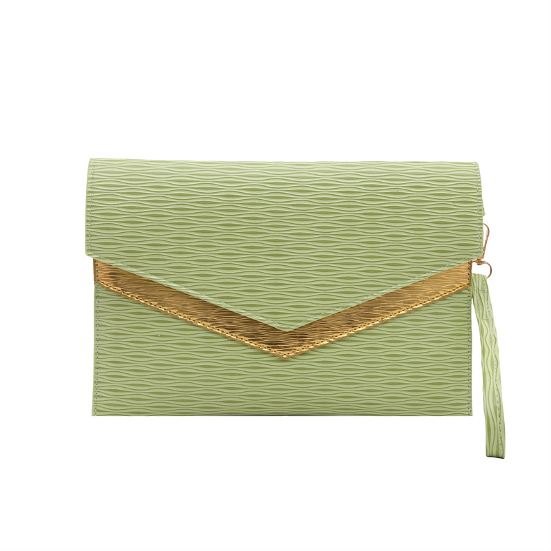 Bolso de sobres de mano de tendencia transfronteriza 2025 primavera nuevo estilo coreano personalidad moda casual temperamento color de contraste bolso de banquete