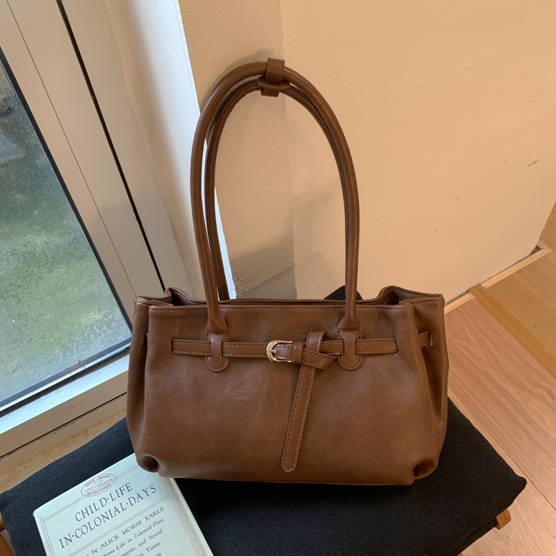 Bolsa de gran capacidad para mujeres otoño y invierno 2025, nuevo estilo coreano de moda retro bolso de hombro para llevar a cabo el trabajo.