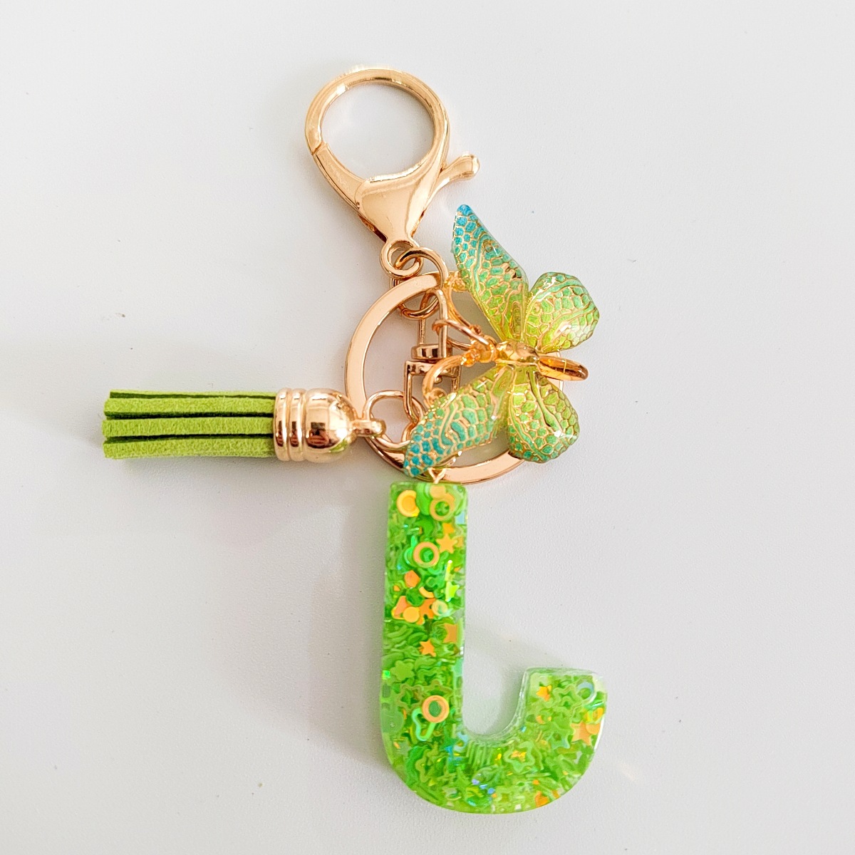 26 letras inglesas llavero colgante estrella verde brillo gota resina colgante llavero de personalidad europea y americana