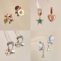 レトロな色の花の星のイヤリングの小さい大衆のデザイン感insシンプルなファッションの非対称の百合の気質のイヤリング