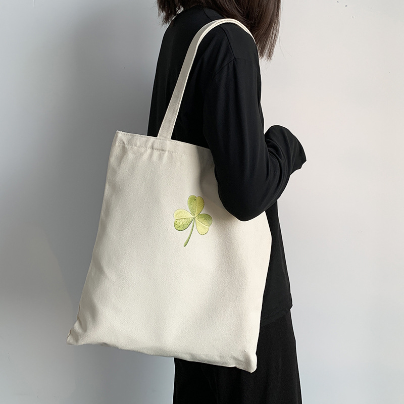 Bolso de lona Clover Bolso de matrícula de gran capacidad de verano para mujer Bolso de libro portátil para estudiantes de primaria y secundaria Bolso de tela portátil